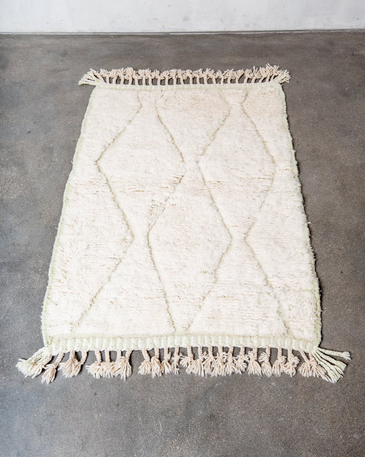Modern, designer, handcrafted Berber rug from Morocco. Beniourain carpet with beautiful colours and patterns and fluffy wool texture.